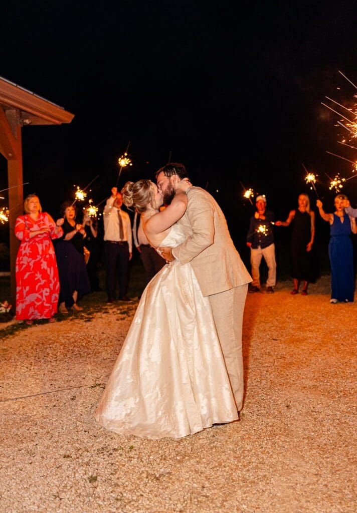 Bride and groom grand exit from the milestone boerne