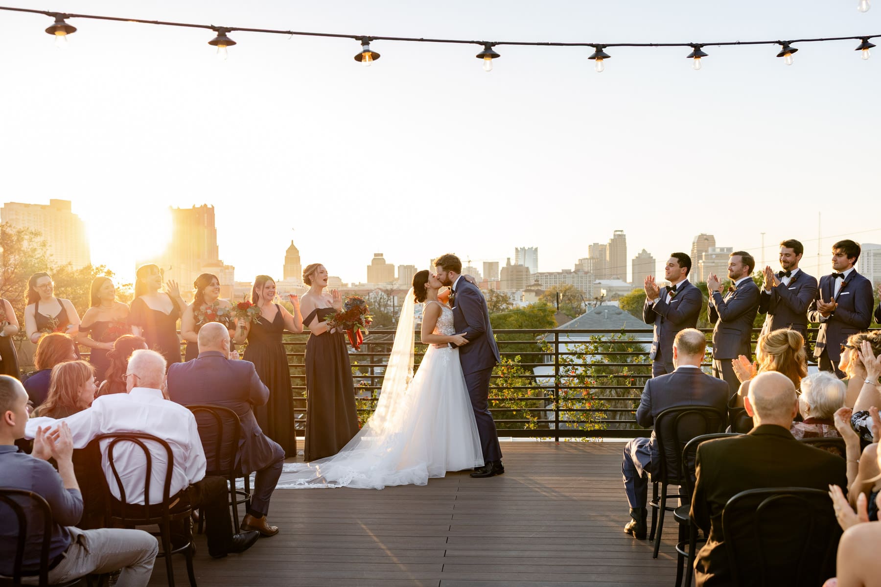 Bride and Groom kiss at the altar