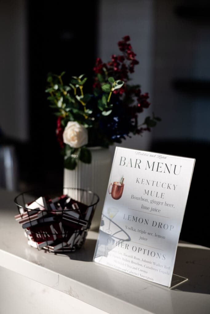 Bar menu details next to a bouquet