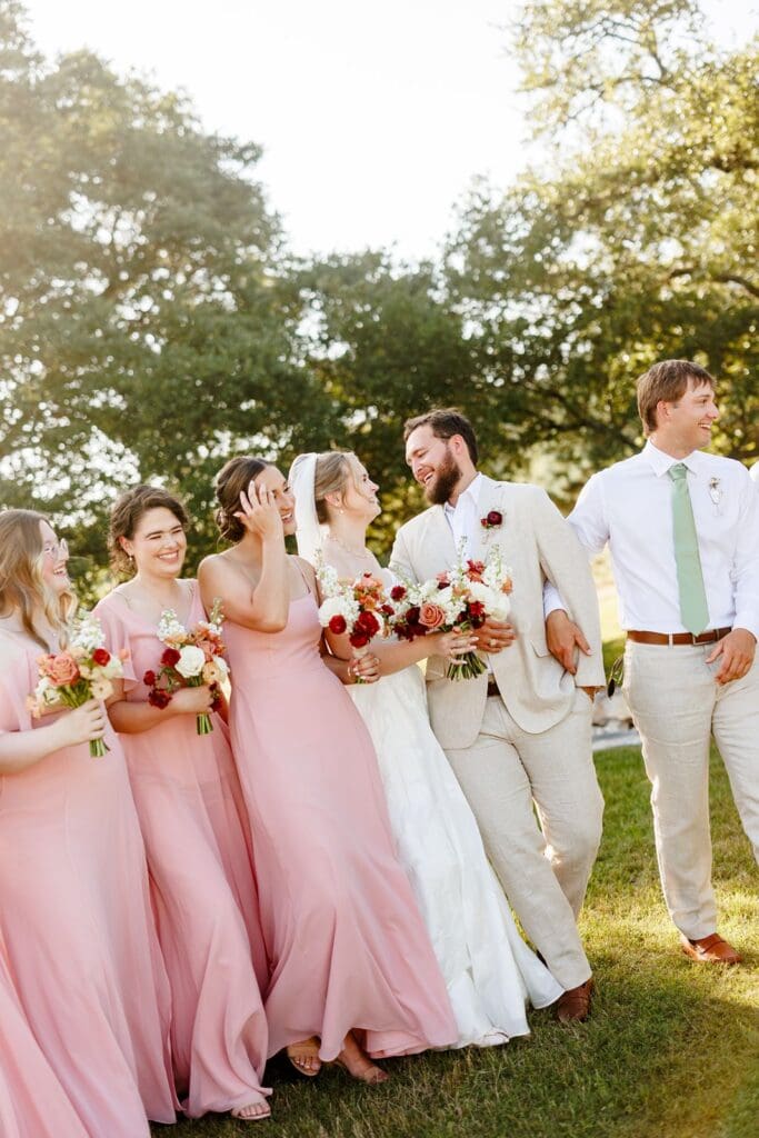 Bride and groom walking together after their ceremony at The Milestone Boerne