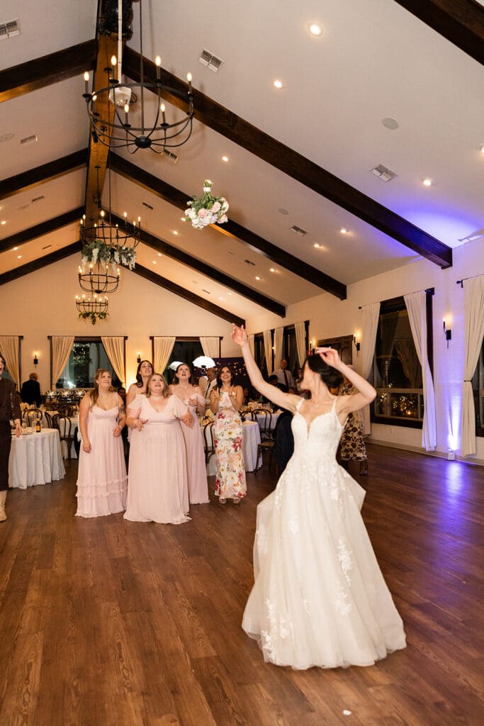 Bride tossing her bouquet