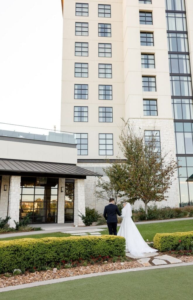 married couple walking into hotel