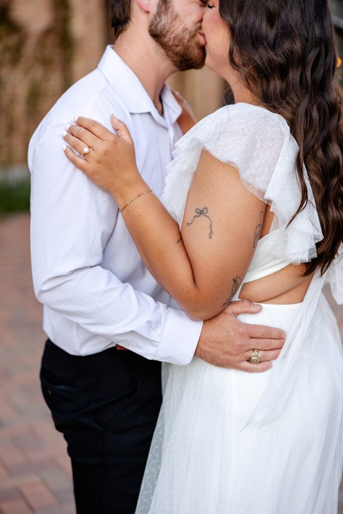 couple kissing at the pearl san antonio