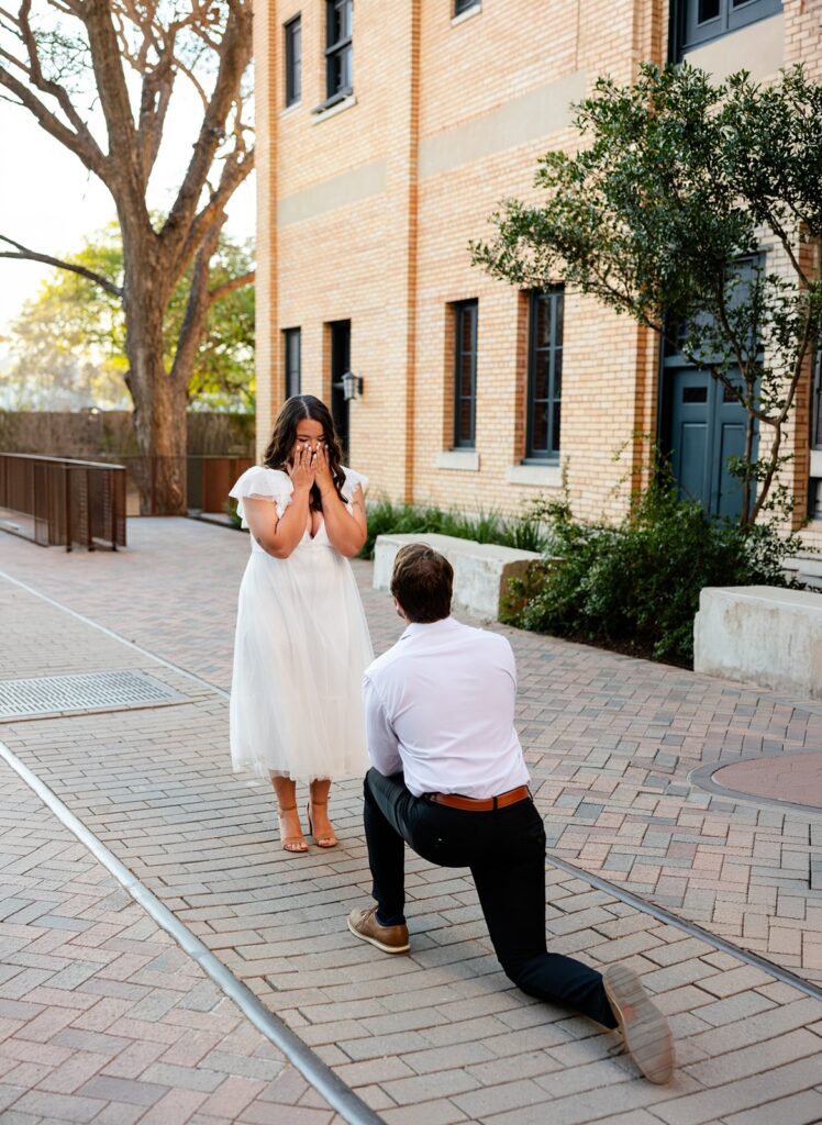 couple getting engaged at the pearl in san antonio