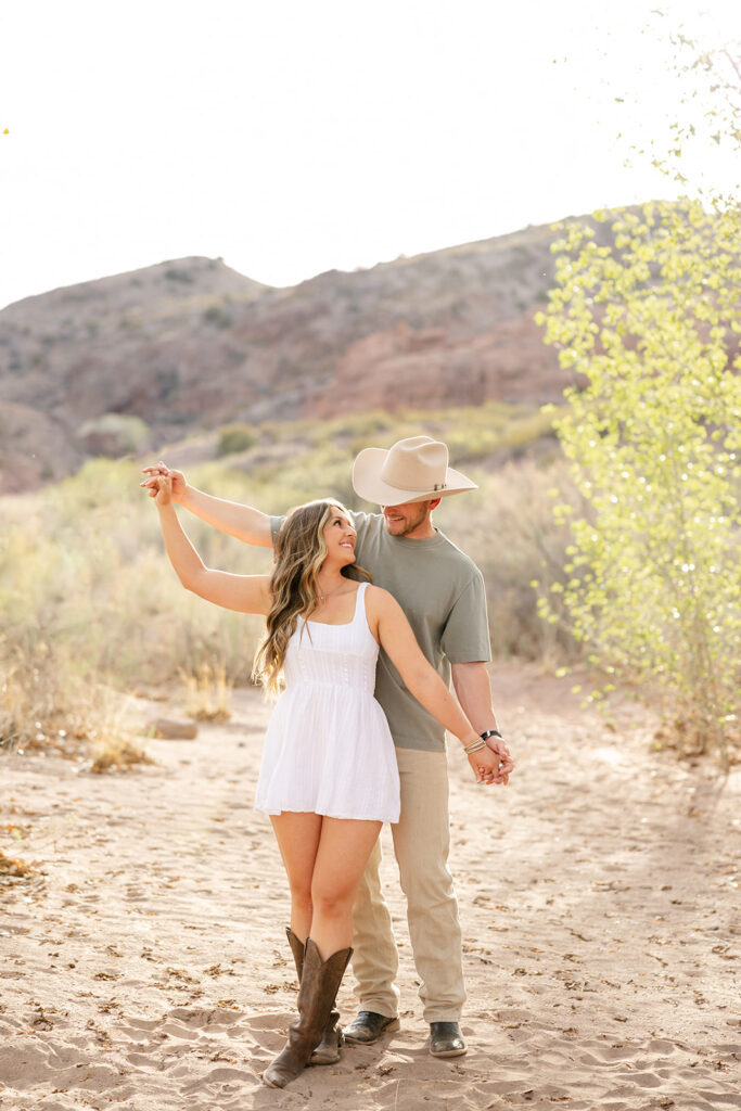 couple interlocking fingers during portraits